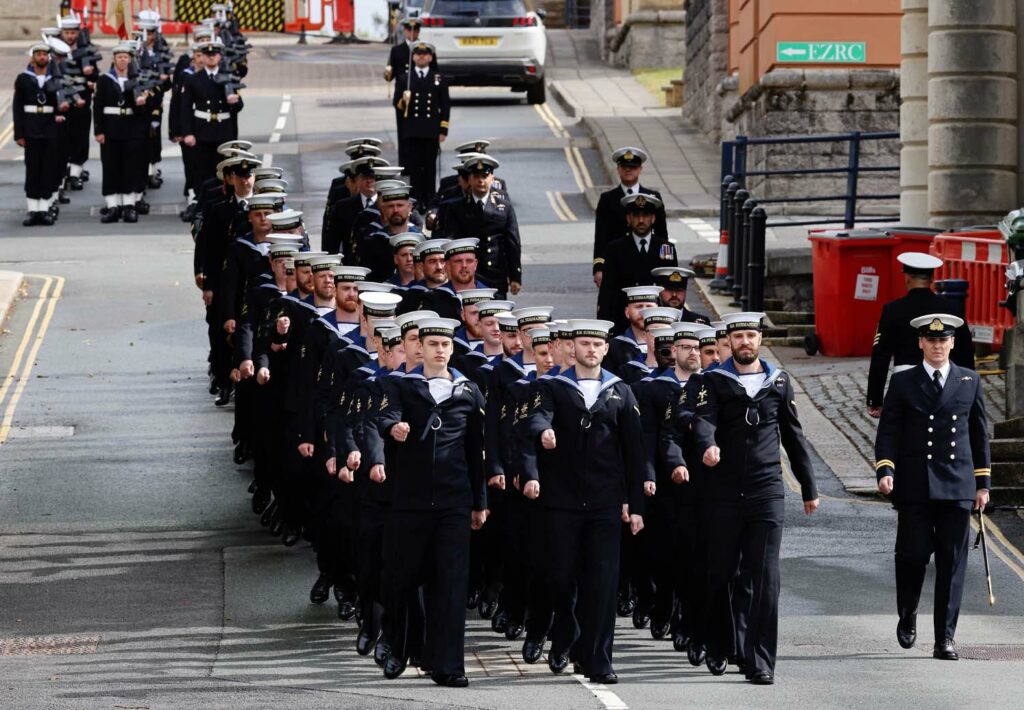 Submariners on formation walking in Plymouth.