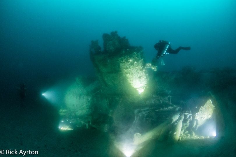 German U-boat being investigated by Royal Navy divers.